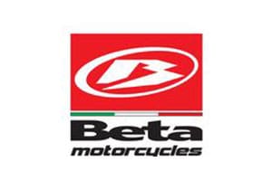 A red and white logo of beta motorcycles.