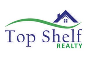 A logo of top shelf realty