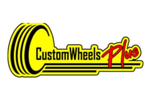 A yellow and black logo for custom wheels plus.